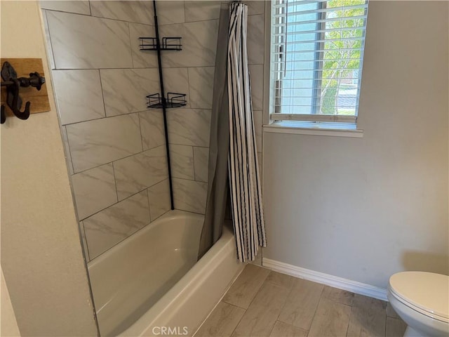 500 Sherri Way, Turlock, CA 95382 - full bath featuring toilet, shower / tub combo, and baseboards