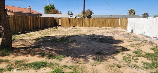 view of yard featuring a fenced backyard