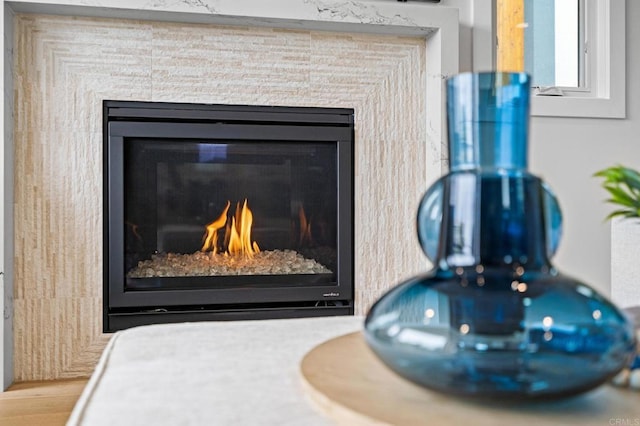 detailed view of a glass covered fireplace