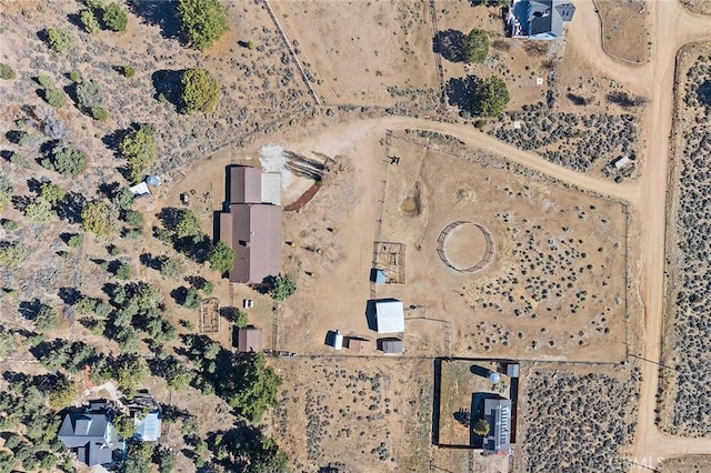 drone / aerial view featuring view of desert