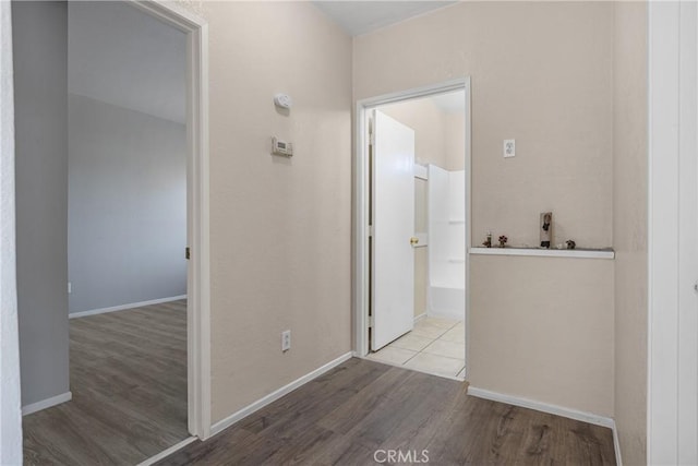1335 N Lugo Ave, San Bernardino, CA 92404 - hall featuring wood finished floors and baseboards