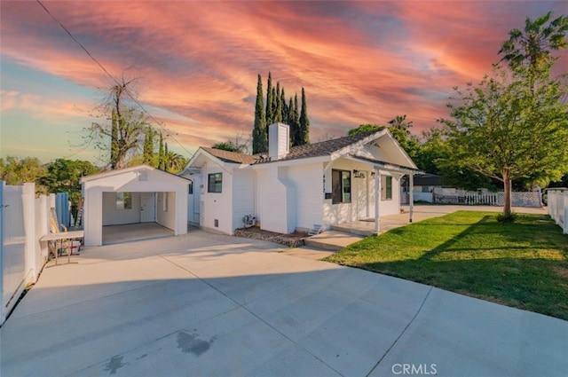 4912 Shaw Ln, Yorba Linda, CA 92886 - single story home featuring a carport, concrete driveway, a chimney, and a porch