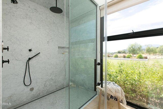 11100 Sulphur Mountain Rd, Ojai, CA 93023 - bathroom featuring a marble finish shower and wood finished floors