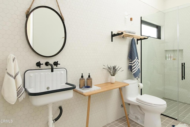 11100 Sulphur Mountain Rd, Ojai, CA 93023 - bathroom with a shower stall, tile patterned floors, a sink, and toilet