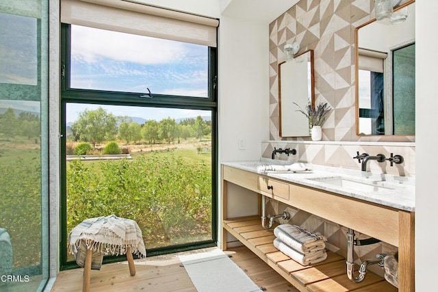 11100 Sulphur Mountain Rd, Ojai, CA 93023 - full bathroom with wood finished floors, double vanity, and a sink