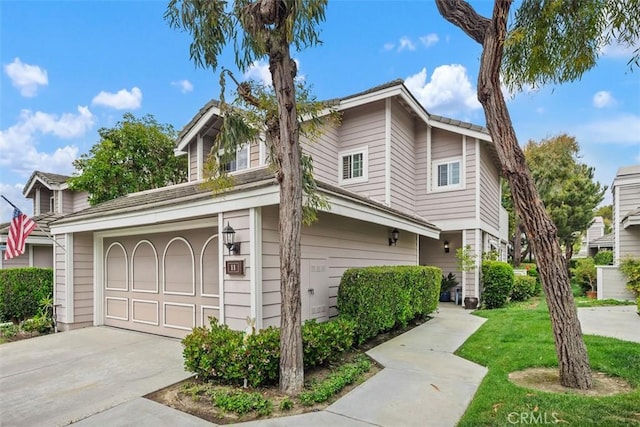 11 New Chardon, Laguna Niguel, CA 92677 - view of front of house with an attached garage and a front yard
