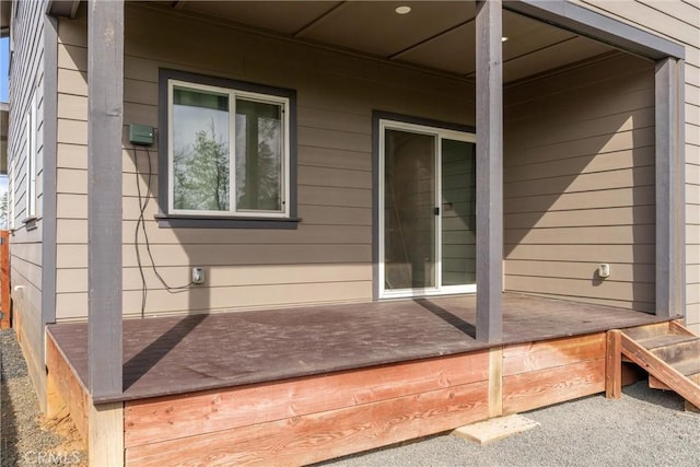 view of side of home featuring a deck
