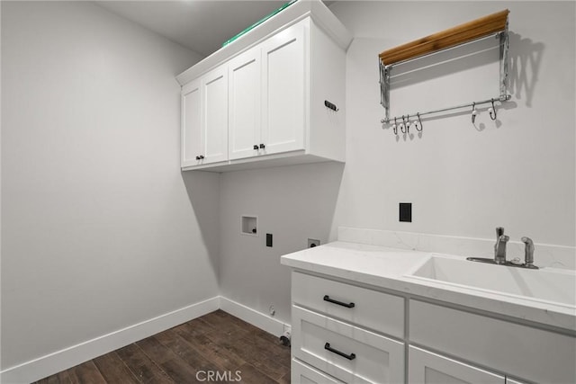 laundry room featuring dark wood-type flooring, a sink, cabinet space, electric dryer hookup, and hookup for a washing machine