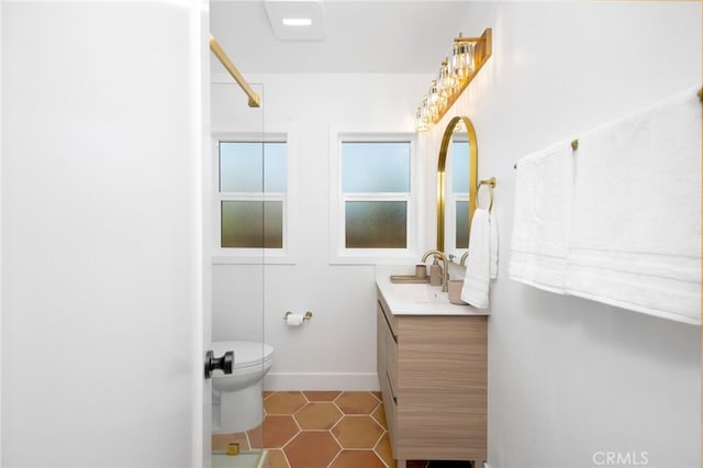 full bath featuring tile patterned floors, toilet, and vanity