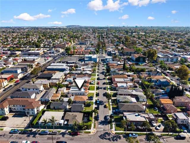 birds eye view of property with a residential view