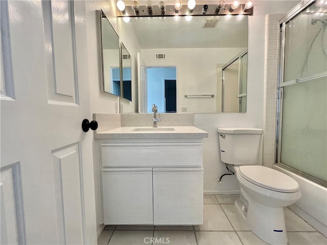 full bathroom with tile patterned flooring, vanity, visible vents, and toilet