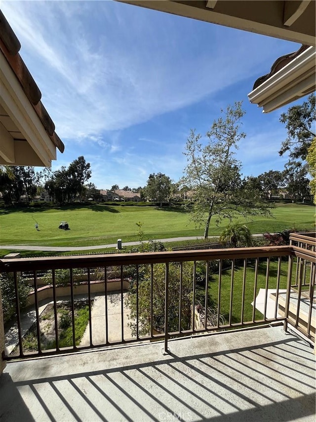 balcony featuring golf course view