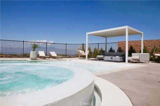 view of swimming pool with a patio, a swimming pool, fence, and an outdoor hangout area