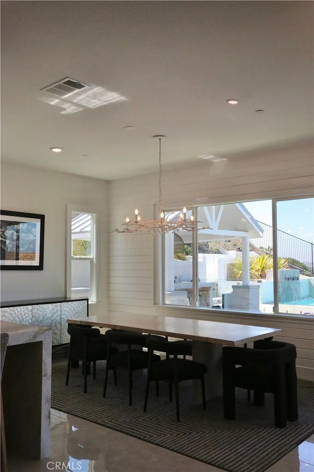 dining area with recessed lighting, a notable chandelier, and visible vents