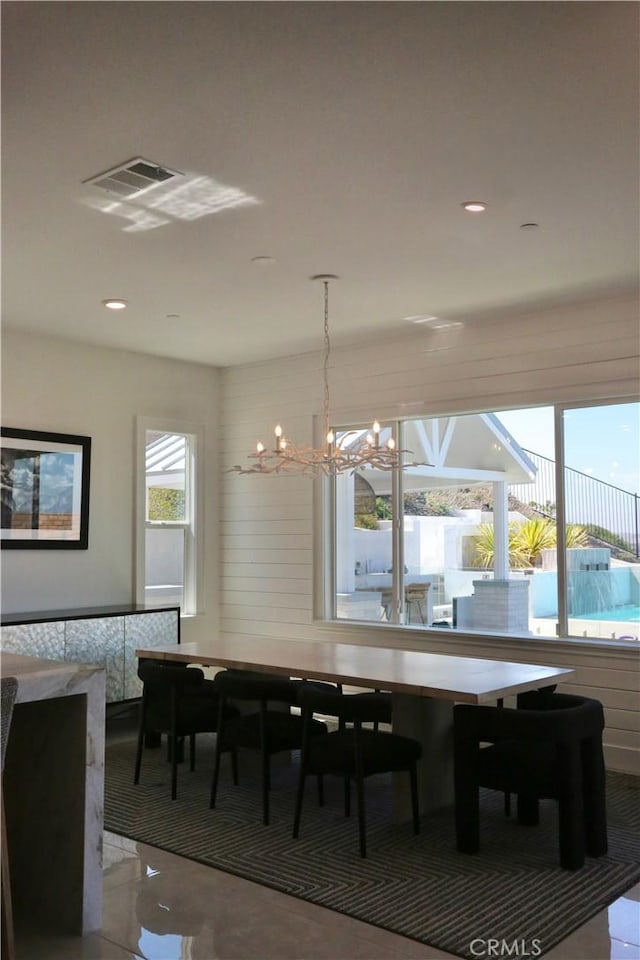 2493 Sierra Bella Dr, Corona, CA 92882 - tiled dining room with a chandelier and recessed lighting