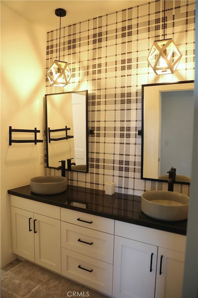 2493 Sierra Bella Dr, Corona, CA 92882 - full bath with double vanity, decorative backsplash, and tile patterned flooring
