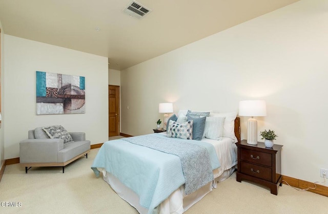 bedroom with carpet and baseboards