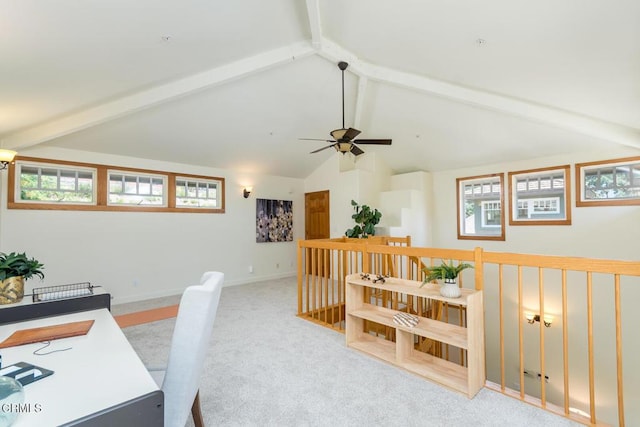 carpeted home office with a ceiling fan and baseboards