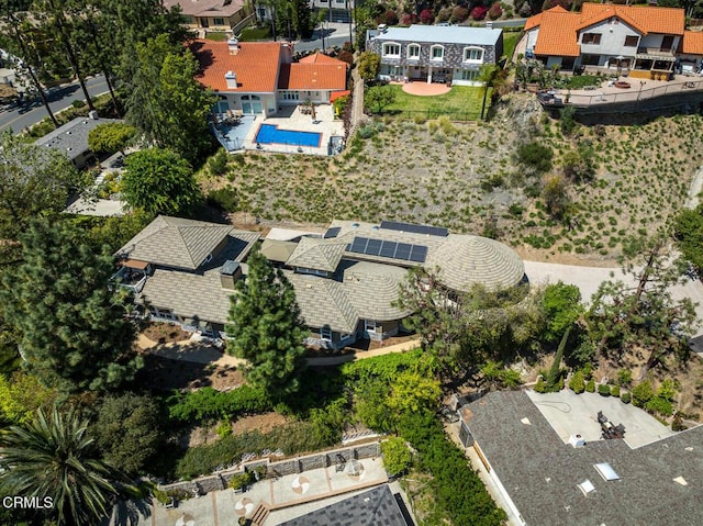 aerial perspective of suburban area with a pool area