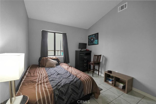 14696 Blackbush Rd, Moreno Valley, CA 92553 - bedroom with baseboards, vaulted ceiling, visible vents, and light tile patterned floors