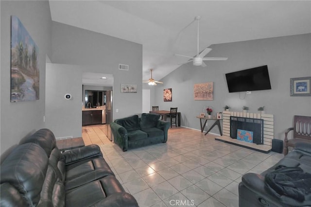 14696 Blackbush Rd, Moreno Valley, CA 92553 - living room featuring visible vents, high vaulted ceiling, ceiling fan, and light tile patterned floors