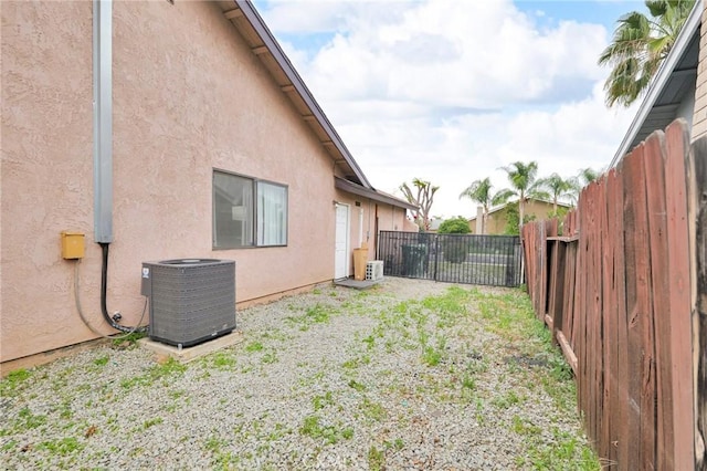 14696 Blackbush Rd, Moreno Valley, CA 92553 - view of yard with a fenced backyard and central AC