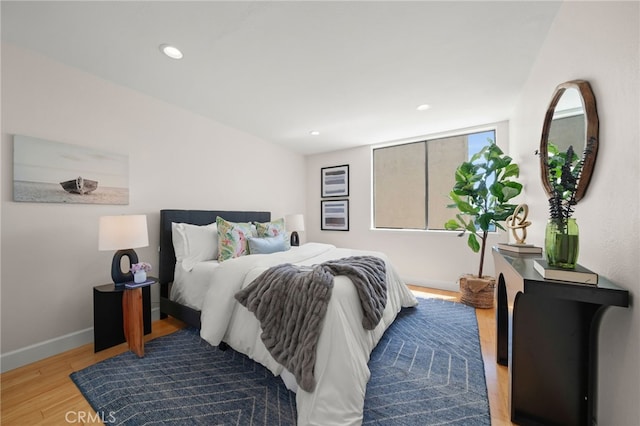 1140 E Ocean Blvd Unit 220, Long Beach, CA 90802 - bedroom with wood finished floors, baseboards, and recessed lighting