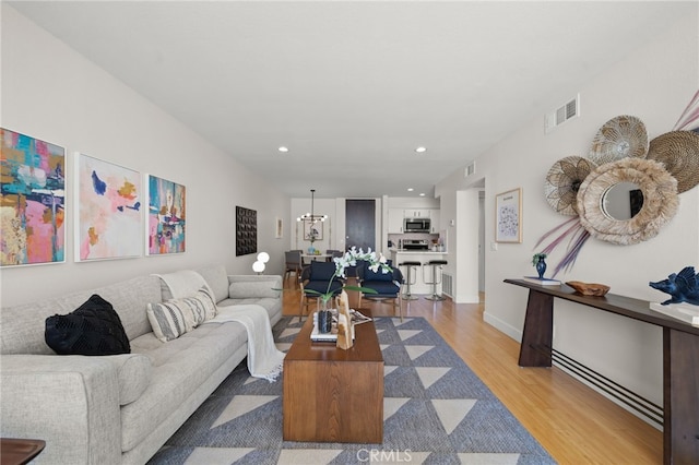 1140 E Ocean Blvd Unit 220, Long Beach, CA 90802 - living room with light wood-type flooring, recessed lighting, and baseboards