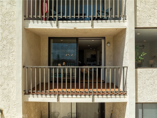 1140 E Ocean Blvd Unit 220, Long Beach, CA 90802 - view of exterior entry with a balcony and stucco siding