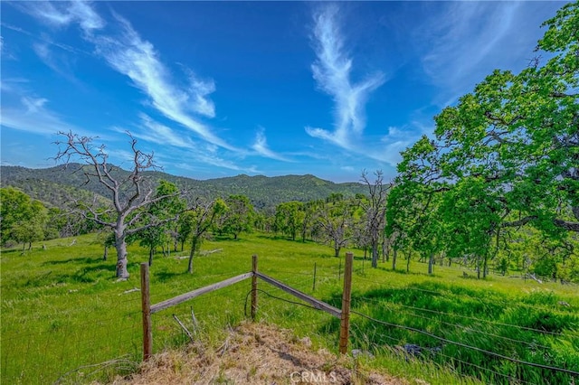 view of mountain feature with a rural view