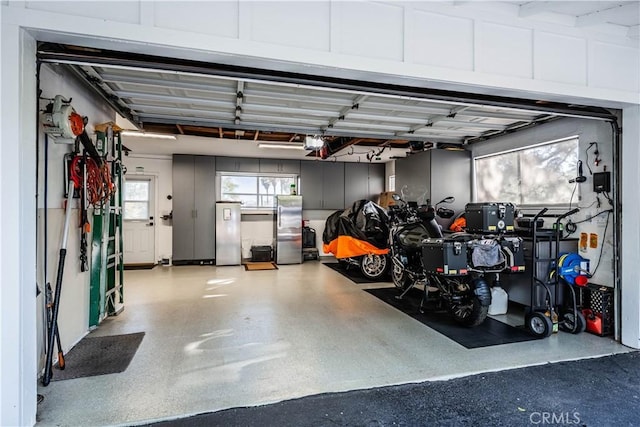 garage featuring a garage door opener