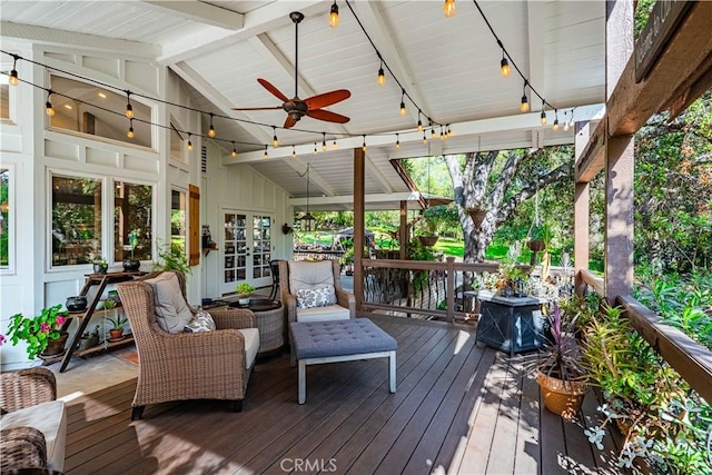 deck featuring french doors and ceiling fan