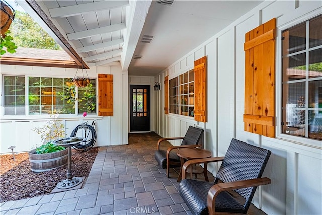 view of patio / terrace featuring visible vents