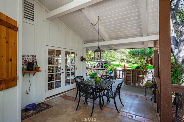 view of patio featuring french doors and outdoor dining space