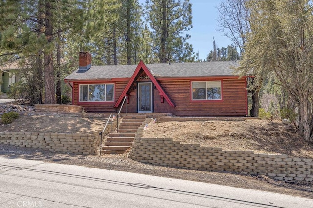 view of front of property with a chimney