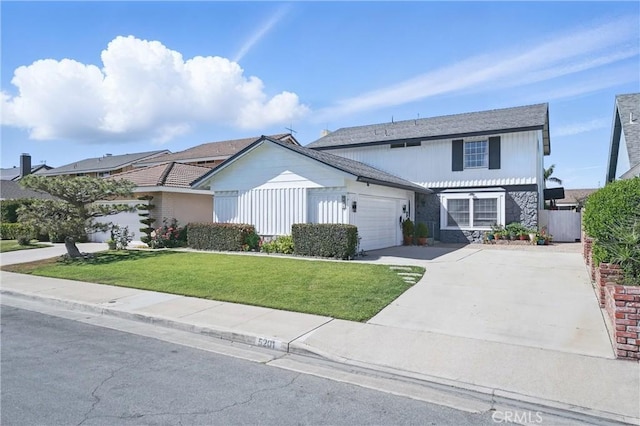 5201 Del Serra Cir, La Palma, CA 90623 - traditional-style house featuring a garage, stone siding, and concrete driveway