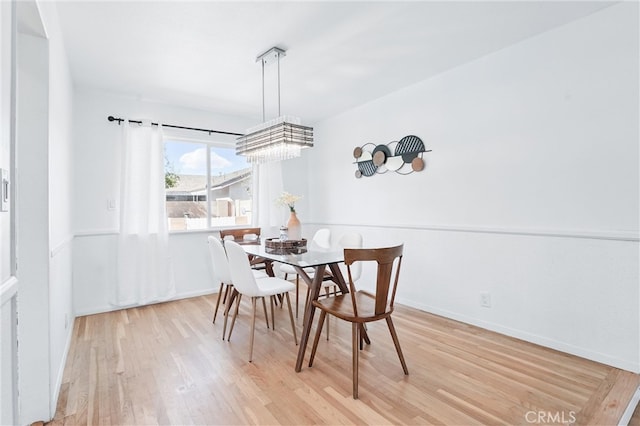 5201 Del Serra Cir, La Palma, CA 90623 - dining room with wood finished floors and baseboards