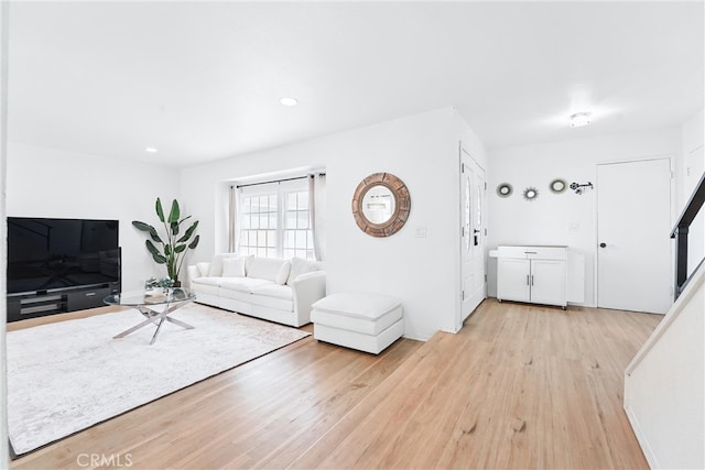 5201 Del Serra Cir, La Palma, CA 90623 - living area featuring light wood finished floors and recessed lighting