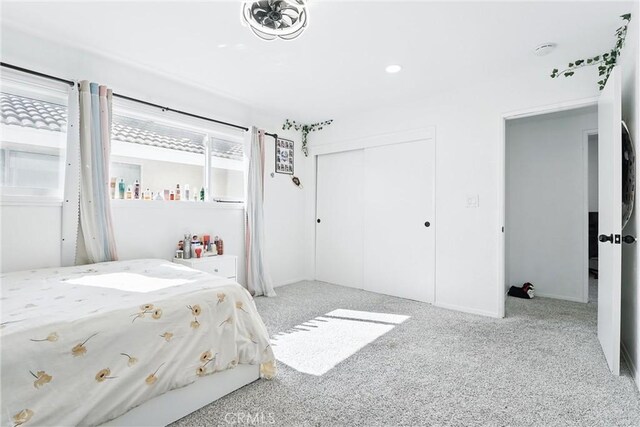 5201 Del Serra Cir, La Palma, CA 90623 - bedroom featuring carpet, a closet, and baseboards