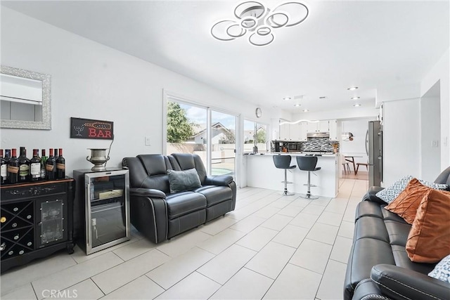5201 Del Serra Cir, La Palma, CA 90623 - living room featuring light tile patterned floors, beverage cooler, and recessed lighting