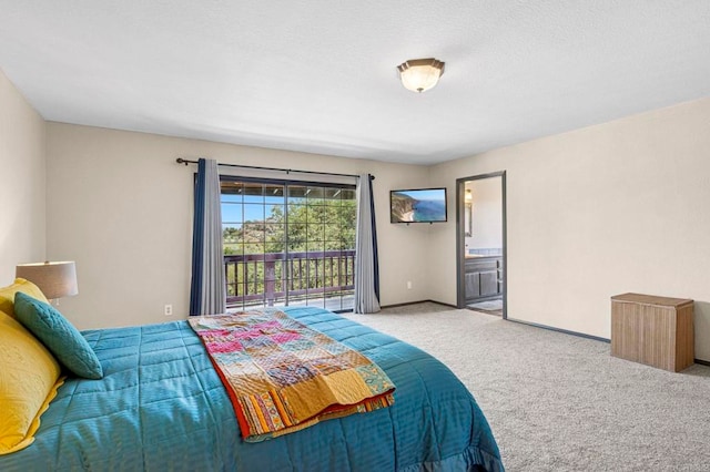 3223 Olive Hill Rd, Fallbrook, CA 92028 - carpeted bedroom featuring ensuite bathroom, access to outside, and baseboards