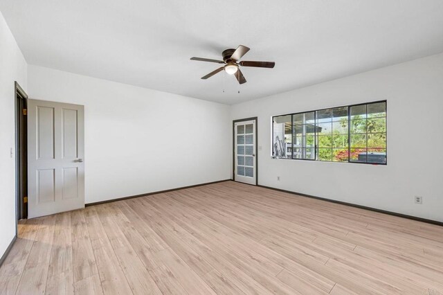 3223 Olive Hill Rd, Fallbrook, CA 92028 - spare room with light wood-style floors, baseboards, and a ceiling fan