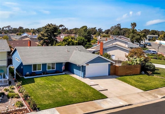 single story home featuring fence, roof with shingles, a residential view, and a garage