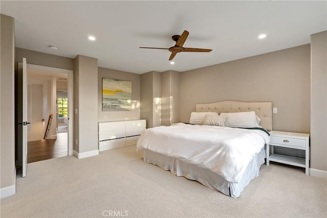 carpeted bedroom featuring baseboards, recessed lighting, and ceiling fan