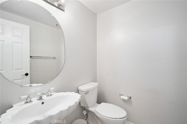 4930 Rockhampton Ct, Yorba Linda, CA 92887 - half bath featuring toilet, baseboards, and a sink