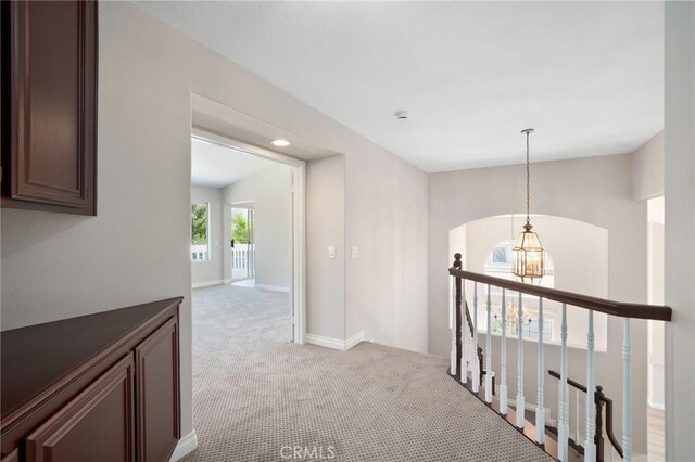 4930 Rockhampton Ct, Yorba Linda, CA 92887 - corridor with light carpet, an upstairs landing, and baseboards