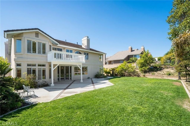 4930 Rockhampton Ct, Yorba Linda, CA 92887 - rear view of property with a patio, stucco siding, a chimney, a balcony, and a yard