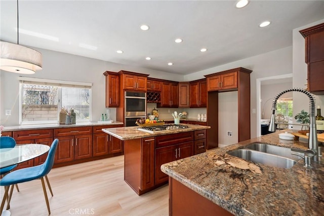 4930 Rockhampton Ct, Yorba Linda, CA 92887 - kitchen featuring a sink, recessed lighting, light wood-style flooring, light stone countertops, and appliances with stainless steel finishes