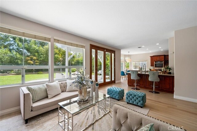 4930 Rockhampton Ct, Yorba Linda, CA 92887 - living area with light wood-style flooring, baseboards, and recessed lighting