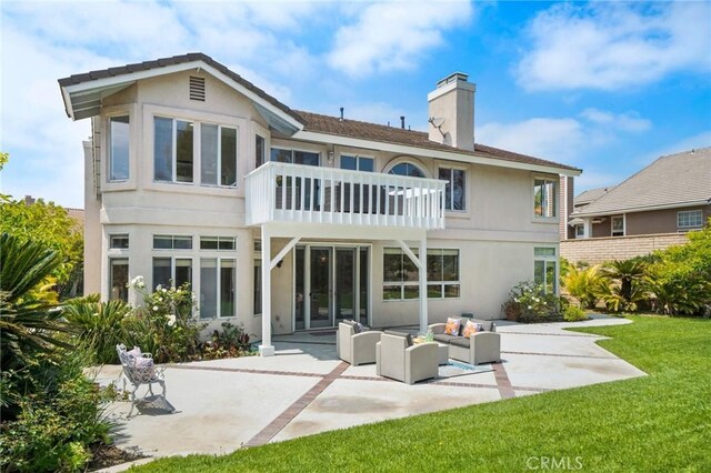 4930 Rockhampton Ct, Yorba Linda, CA 92887 - back of house with a balcony, a yard, a patio, a chimney, and outdoor lounge area